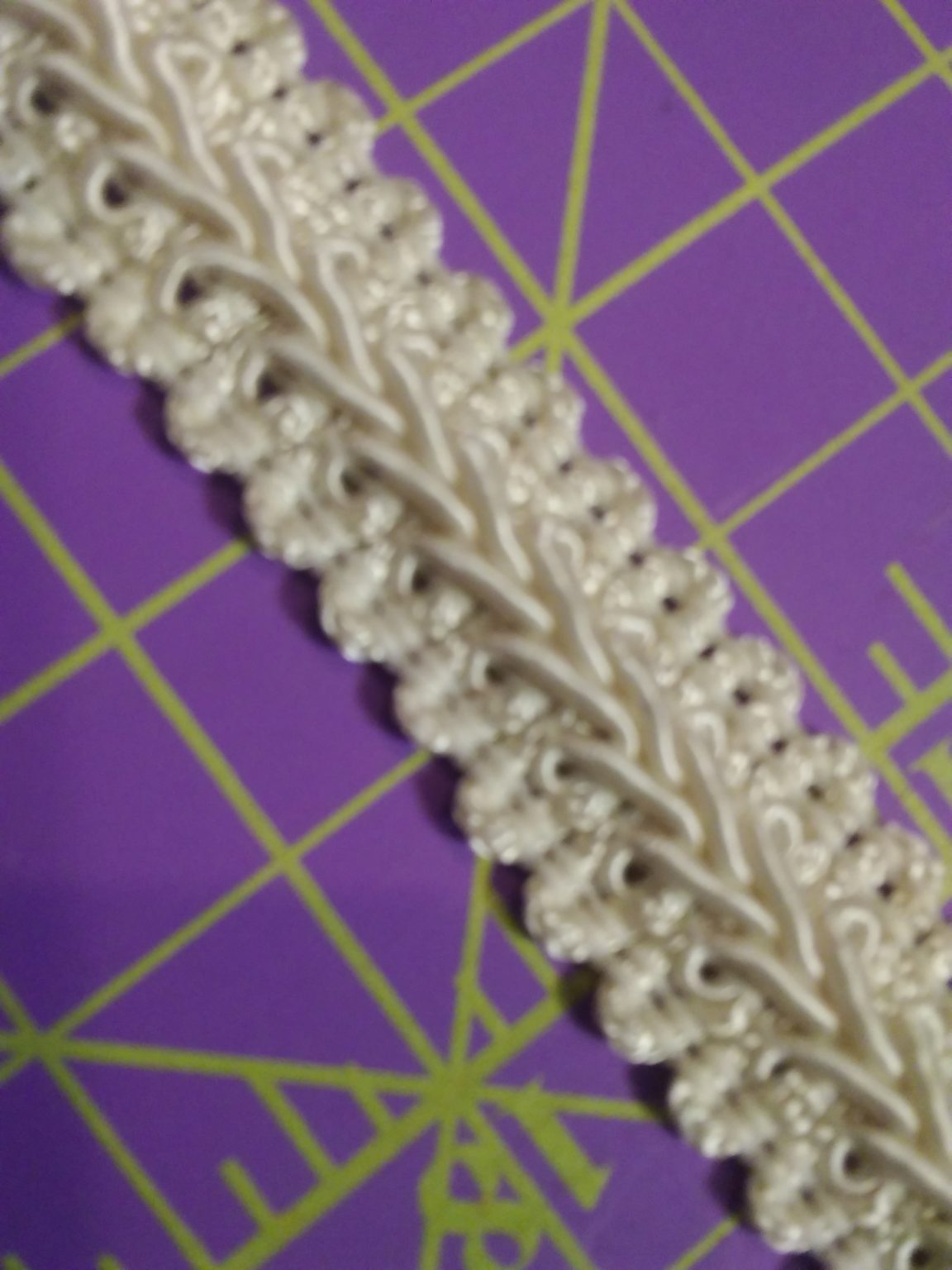 BRD60298 5/8″ Ivory Braided Trim